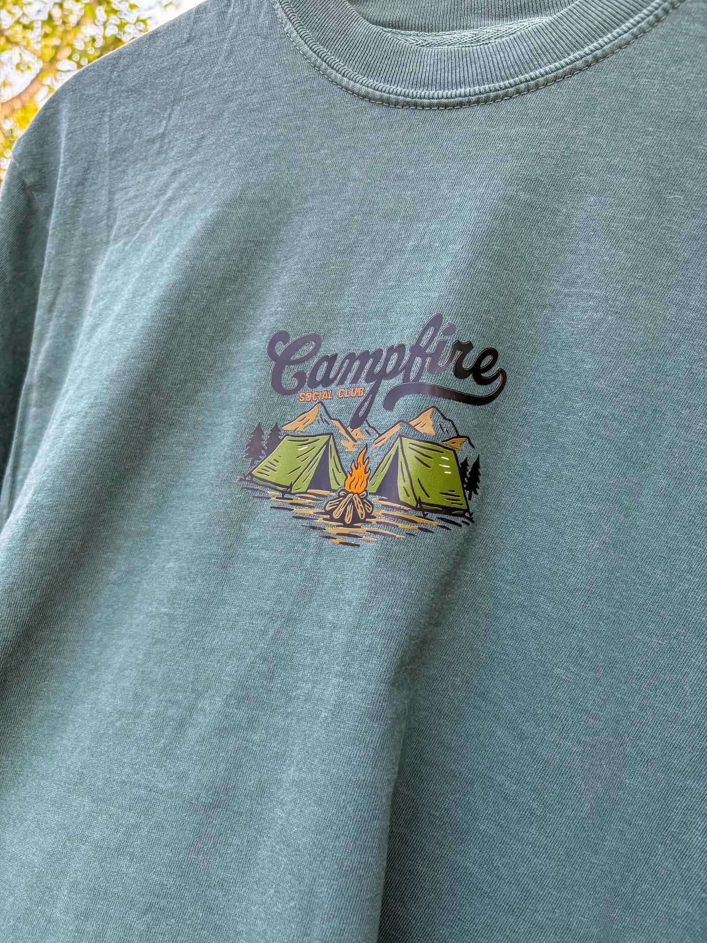 'Campfire' design featuring tents and a campfire on a tshirt