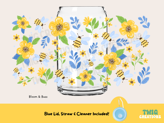 Glass with floral and bee design on a white background